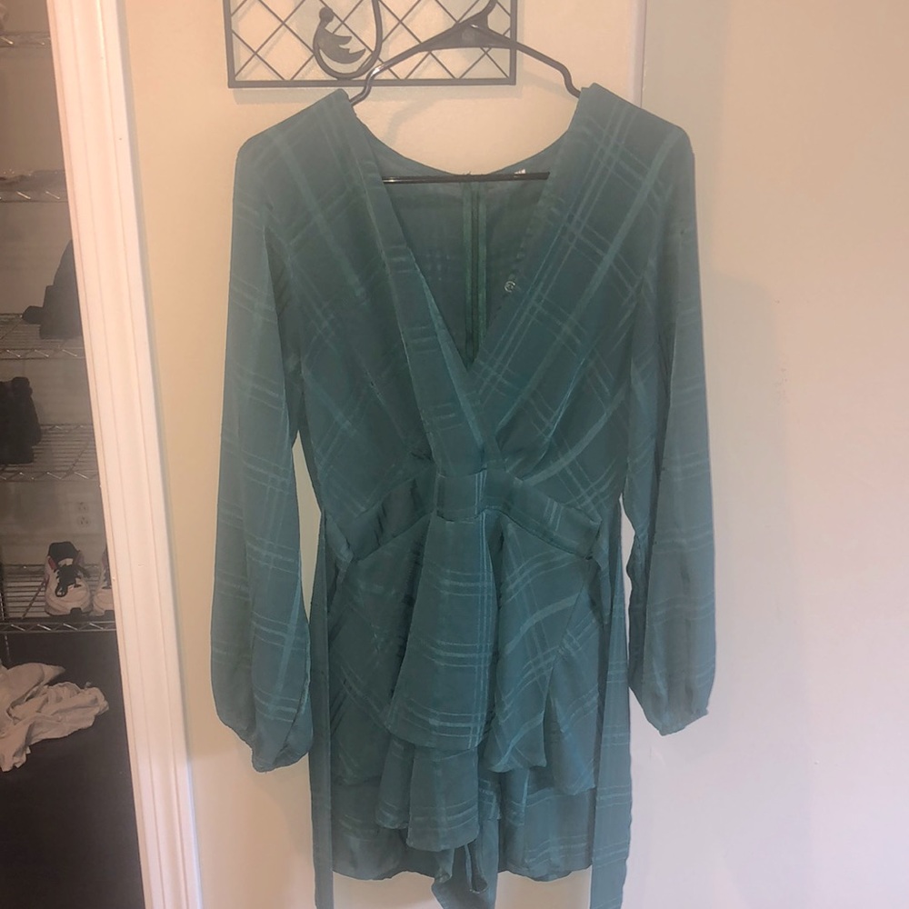 This beautiful unique green dress is ideal for the summer on the beach